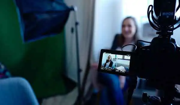 Women Front of Camera And Part of a video Production